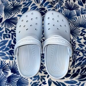 Light blue crocs in great condition.